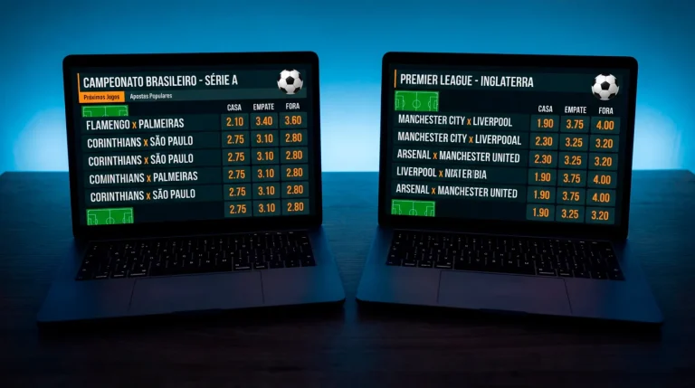 Dois ecrãs de computador portátil com odds de futebol lado a lado